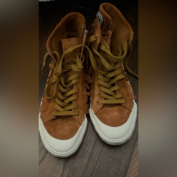 The sneakers are the ASH Marlow Fringe Lace Up High Top Sneakers. Size 38 - Picture 5 of 16